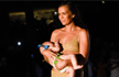 Model Breastfeeds Baby On Catwalk - And Stirs Debate
